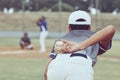 Baseball, pitcher and ball in hand, player ready to pitch and young men playing on field. Sports, fitness and Royalty Free Stock Photo