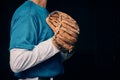 Baseball pitcher, hand and glove in studio for sport, training and throwing by black background. Man, cropped and hands Royalty Free Stock Photo