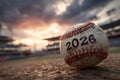 Baseball on Pitcher's Mound with 2026 Label at Sunset in Stadium Royalty Free Stock Photo