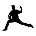 Baseball Pitcher silhouette, stretched forward to delivery a pitch from a rubber mound