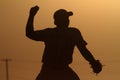 Baseball pitcher at sunset Royalty Free Stock Photo
