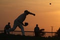 Baseball pitcher at sunset Royalty Free Stock Photo