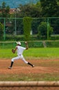 Baseball pitcher is throwing a ball in a stadium in Bandung, Indonesia