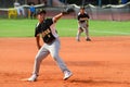 Baseball pitcher throwing a ball Royalty Free Stock Photo