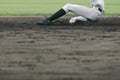 Baseball player attempting to steal a base Royalty Free Stock Photo