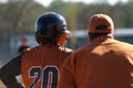 Baseball player and base coach Royalty Free Stock Photo