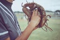 Baseball player, hands or ball in mitt on grass field for fitness, workout and training in game, match and competition Royalty Free Stock Photo