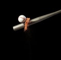 Baseball player hit ball with silver bat and sand soil explode in air. Baseball players in dynamic action hit ball smoke tail.