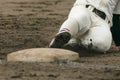 Baseball player sliding into a base Royalty Free Stock Photo