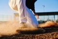 Baseball player sliding into base