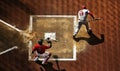 Baseball Player Standing Next to Base on Field Royalty Free Stock Photo