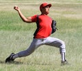 Baseball player throws the ball down the line Royalty Free Stock Photo
