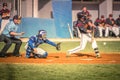 Baseball players during an action