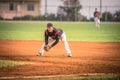 Baseball players during an action