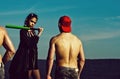 Baseball players of muscular men with body and wet torso in cap, girl with long fashionable indie hairstyle, woman