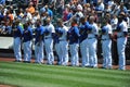 The Star-Spangled Banner being played at a baseball game.