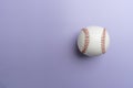 baseball on purple or violet background, top view sport concept