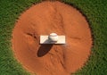 A baseball rests on a pitcher\'s Royalty Free Stock Photo