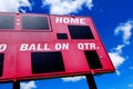 Baseball Scoreboard Competition with Blue Sky and Clouds Royalty Free Stock Photo