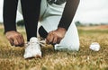 Baseball, shoes and grass with ball and baseball player, sports and fitness closeup during game on baseball field