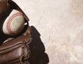 Baseball glove and ball in hard light Royalty Free Stock Photo
