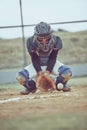 Baseball, sports and ball with a catcher on a grass pitch or field during a game or match outdoor. Fitness, exercise and Royalty Free Stock Photo