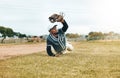 Baseball, sports and catch with a man athlete catching a ball during a game or match on a field for sport. Fitness