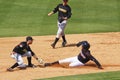 Baseball - stolen base or tagged out?! Royalty Free Stock Photo