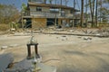 Baseball trophy and debris in front of house