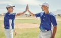 Baseball, winning and high five for success on field for match game at pitch in Boston, USA. Team, friends and black