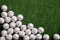 Baseballs on a green turf background Royalty Free Stock Photo