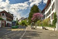 Green tram on the Leonhardsgraben street. Grossbasel district, city of Basel, Switzerland, Europe Royalty Free Stock Photo