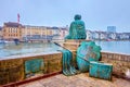 The modern sculpture Helvetia auf der Reise on Mittlere Brucke bridge, on April 1 in Basel, Switzerland Royalty Free Stock Photo