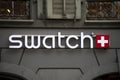Swatch logo on jewelry store front in the street