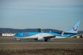 Boeing 737 of the company TUIfly rolling on the runway after the landing