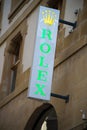 Rolex logo on signboard on jewelry front in the street Royalty Free Stock Photo