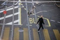 Portrait on top view of man walking in the street on yellow pedestrian pathway Royalty Free Stock Photo