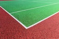 Baseline on green hard tennis court Royalty Free Stock Photo