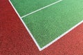 Baseline on green tennis court Royalty Free Stock Photo