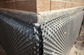 Basement and foundation waterproofing: Installation of the waterproofing, dampproofing and drainage dimpled membrane on the Royalty Free Stock Photo