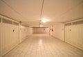 Basement garage in an underground parking lot of the apartment b Royalty Free Stock Photo