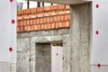 Basement insulation with foam. Insulation and waterproofing of the underground part of the building. Construction of the Royalty Free Stock Photo