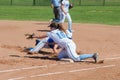 Baserunner diving back to the bag Royalty Free Stock Photo