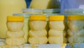 Bashkir honey in plastic jars in the shape of a bear stands on a trading table