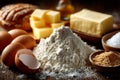 Basic baking ingredients creating a still life, featuring flour, butter, eggs, sugar, oil and salt Royalty Free Stock Photo