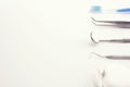 Basic dental tools on white background Royalty Free Stock Photo