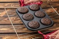 Basic homemade brownie or chocolate muffins raw dough in baking pan. Cooking homemade chocolate muffins, cupcakes Royalty Free Stock Photo