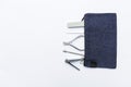 Basic nail tool kit in blue bag isolate on white background