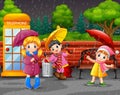 Cartoon three girl carrying umbrella under the rain in the city park Royalty Free Stock Photo