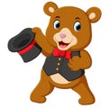 A big circus bear uses the best costume and holding his hat